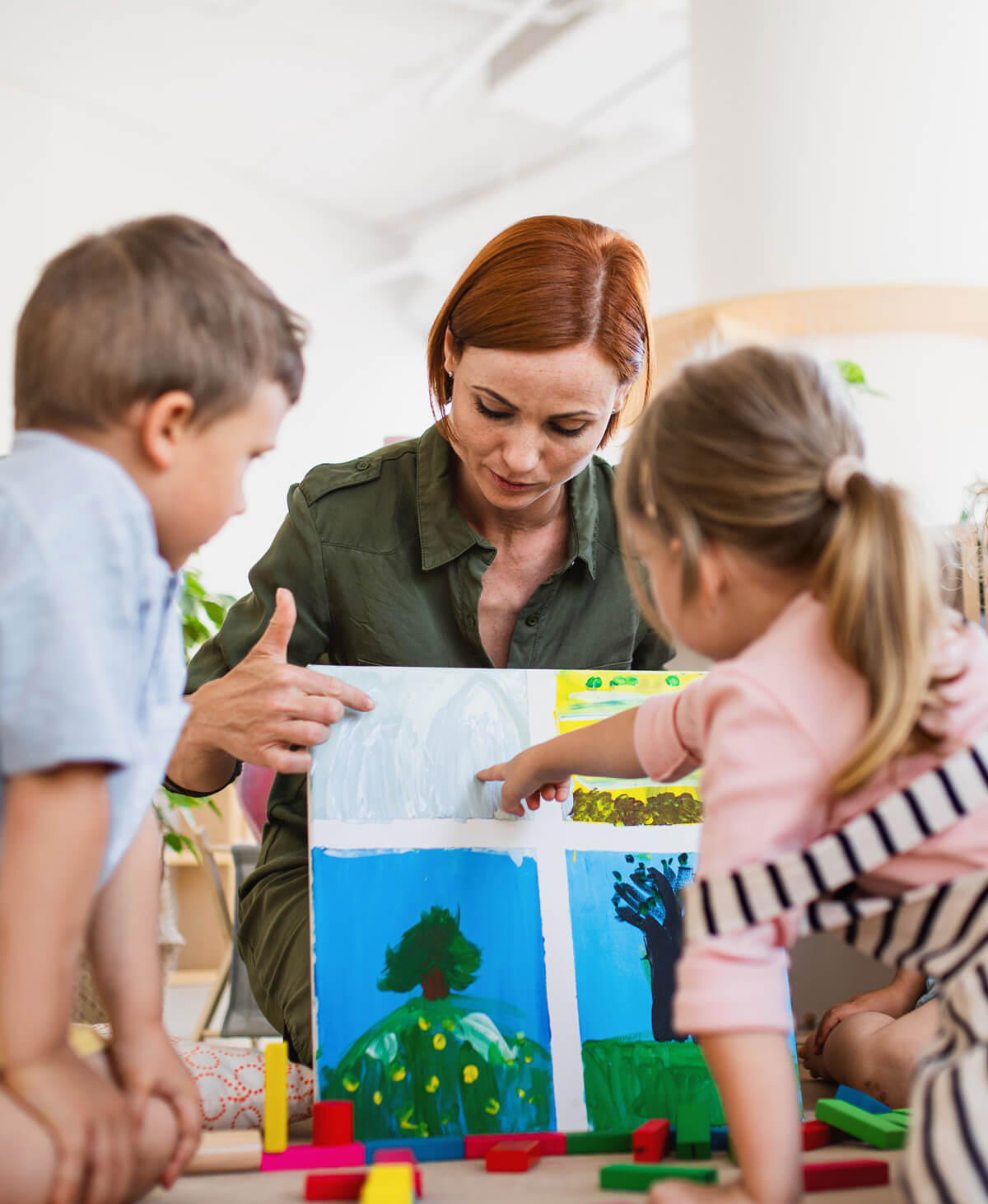 Group Programs Children Studying A Drawing And Playing